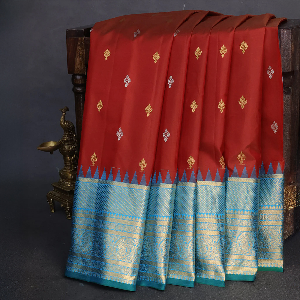 Pure gadwal silk saree maroon and cs blue with zari woven buttas and temple design zari woven border