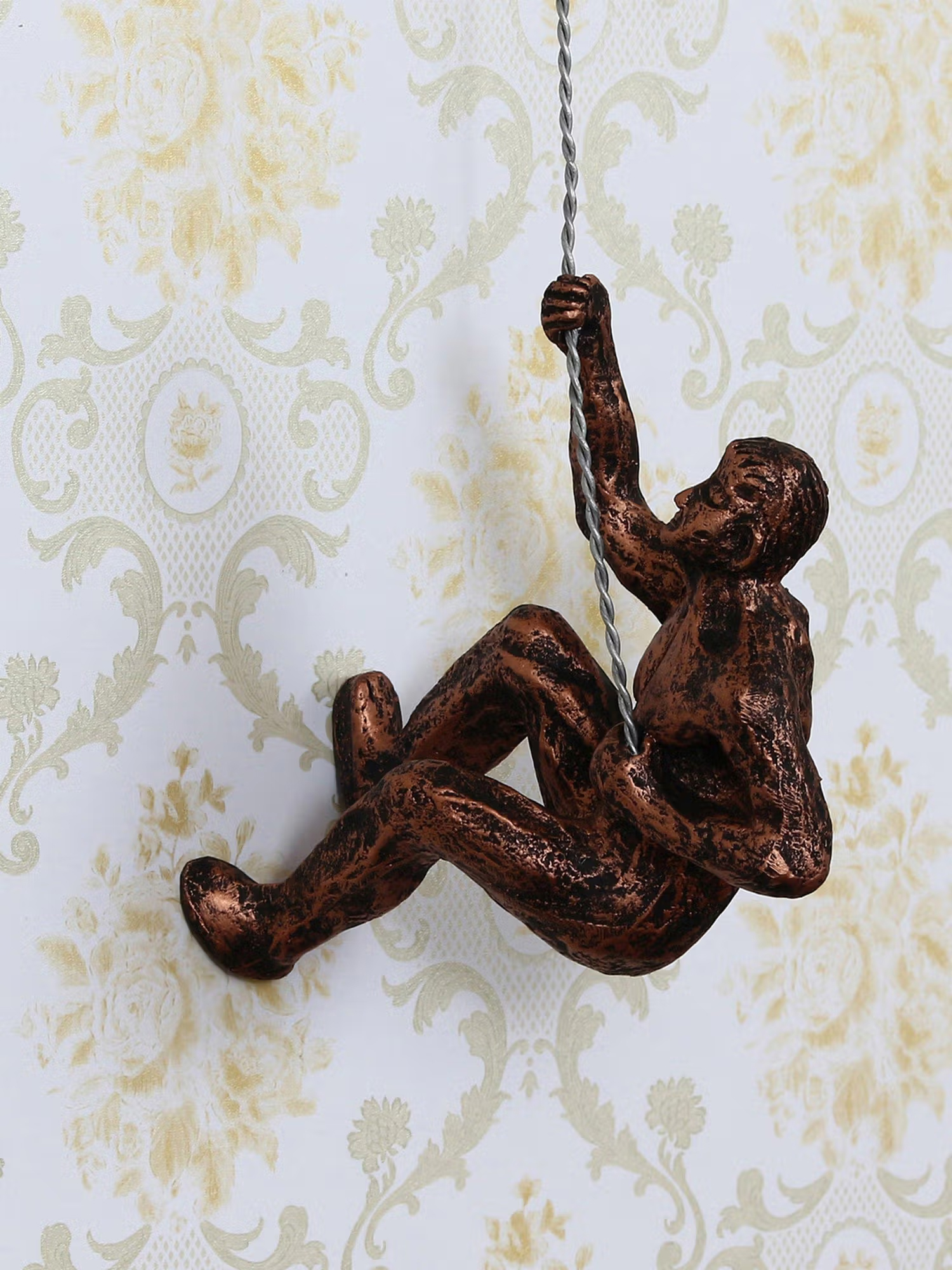 eCraftIndia Man Trying to Climb Decorative Wall Hanging Figurine